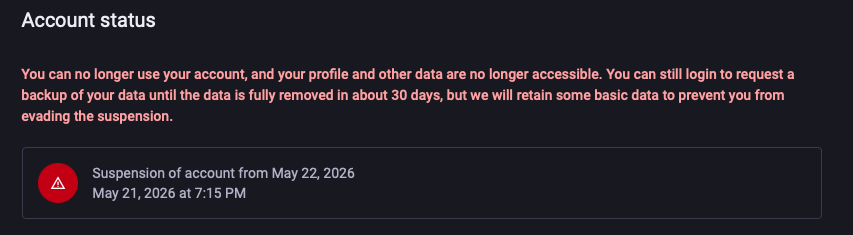 Account status page showing suspended account notice with warning icon, suspension date of May 22, 2026, and message about data removal in 30 days
